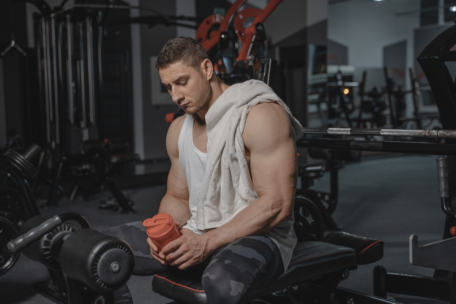 A Man Holding a Protein Shaker